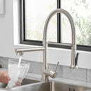 Modern matte black and brushed nickel spring kitchen faucet