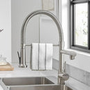Modern matte black and brushed nickel spring kitchen faucet