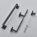 Modern matte black bathroom set with towel rack and gold rod accessories