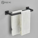 Modern matte black bathroom set with towel rack and gold rod accessories
