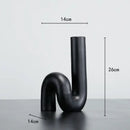 Modern matte black pipe geometric twist knot figurine living room decor