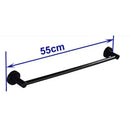 Modern matte black wall mounted towel bar with wood accents bathroom