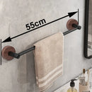 Modern matte black wall mounted towel bar with wood accents bathroom