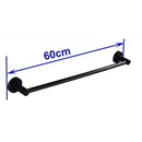 Modern matte black wall mounted towel bar with wood accents bathroom