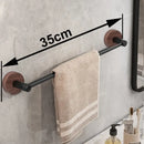 Modern matte black wall mounted towel bar with wood accents bathroom