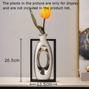 Modern metallic oval ceramic vase with artificial flowers – desk decor