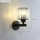 Modern minimalist gold wall lamp with crystal shade for bedroom
