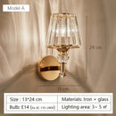 Modern minimalist gold wall lamp with crystal shade for bedroom