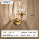 Modern minimalist gold wall lamp with crystal shade for bedroom