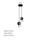 Modern minimalist gray and gold pendant light dining room