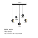Modern minimalist gray and gold pendant light dining room