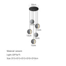 Modern minimalist gray and gold pendant light dining room