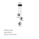 Modern minimalist gray and gold pendant light dining room