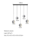 Modern minimalist gray and gold pendant light dining room