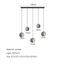 Modern minimalist gray and gold pendant light dining room
