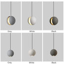 Modern minimalist gray and gold pendant light dining room