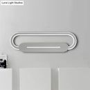 Modern minimalist gray oval led wall sconce bedroom light
