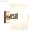Modern nickel cuboid wall mounted sconce with glass for corridors