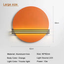 Modern orange and black circular wall lamp for bedroom