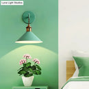 Modern pink conical metal wall sconce – hallway gray pink light