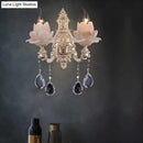 Modern pink lotus wall lamp with teardrop crystal – bedroom sconce