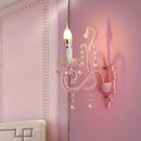 Modern pink metallic scroll arm wall lamp with crystal bedroom sconce