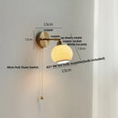 Modern ribbed ceramic led wall lights with brass arm bedroom sconce