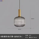 Modern ribbed glass pendant lights for dining room with brass stem
