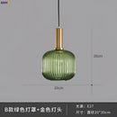 Modern ribbed glass pendant lights for dining room with brass stem