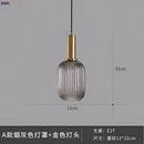 Modern ribbed glass pendant lights for dining room with brass stem