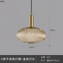 Modern ribbed glass pendant lights for dining room with brass stem