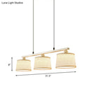 Modern silver and flaxen circle pendant light for kitchen island