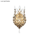 Modern silver & brass laurel wall light with crystal drop bedroom