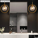 Modern smoke gray & clear glass globe sconce bedroom wall light