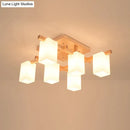 Modern square wood living room flush mount with white glass shade