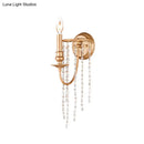 Modern style gold sconce with clear crystal beaded strand bedroom light