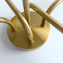 Modern symmetrical brass ceiling light with five spheres for living room