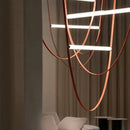 Modern tan leather and brass led tube suspension chandelier living room