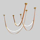 Modern tan leather and brass led tube suspension chandelier living room
