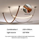 Modern tan leather and brass led tube suspension chandelier living room