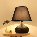 Modern tapered drum black ceramic table lamp bedroom lighting