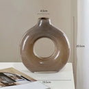 Modern taupe and clear geometric circles glass vase living room decor