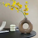 Modern taupe and clear geometric circles glass vase living room decor