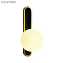 DecorBites™ Modern Clear/Cream Glass Orb Wall Light with Brass Mount