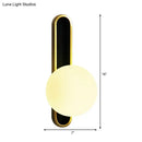 DecorBites™ Modern Clear/Cream Glass Orb Wall Light with Brass Mount