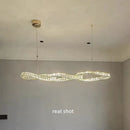 Modern twisted gold metal crystal pendant light for dining room