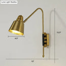 Modern white and brass v-shaped wall light bedroom reading lamp