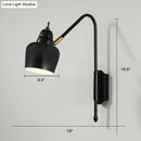 Modern white and brass v-shaped wall light bedroom reading lamp