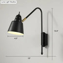 Modern white and brass v-shaped wall light bedroom reading lamp