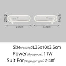 Modern white bedside wall lamp with wireless charging for bedroom